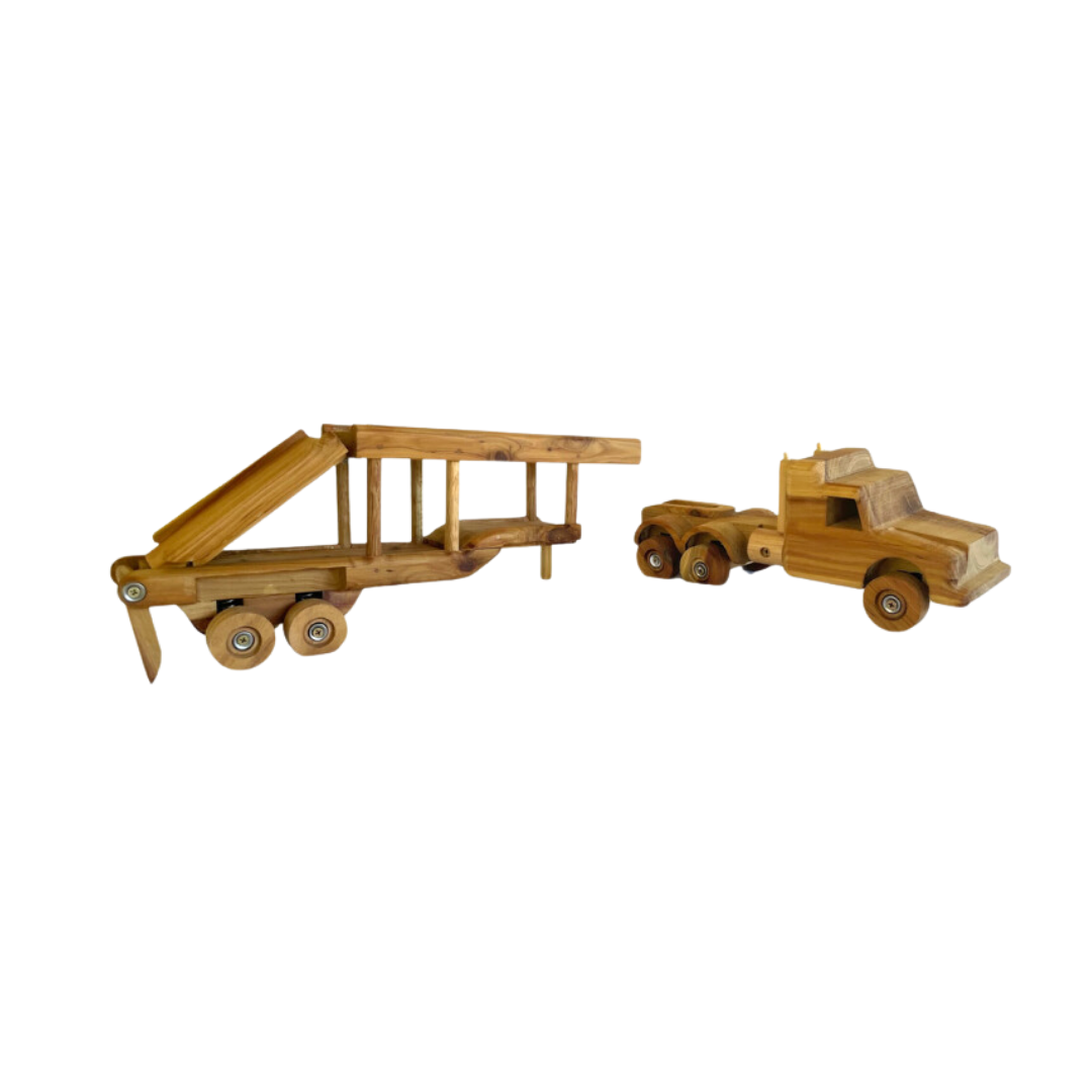 Angled view of a wooden car carrier toy showing the lower deck ramp extended, highlighting interactive play features. - Kids Toy | Imagination Toy Shop