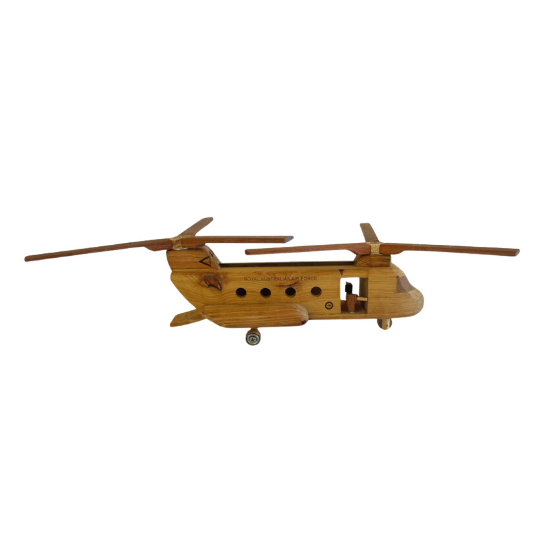 Side view of a wooden Chinook helicopter toy with detailed RAAF markings and operational dual rotors. - Kids Toy | Imagination Toy Shop