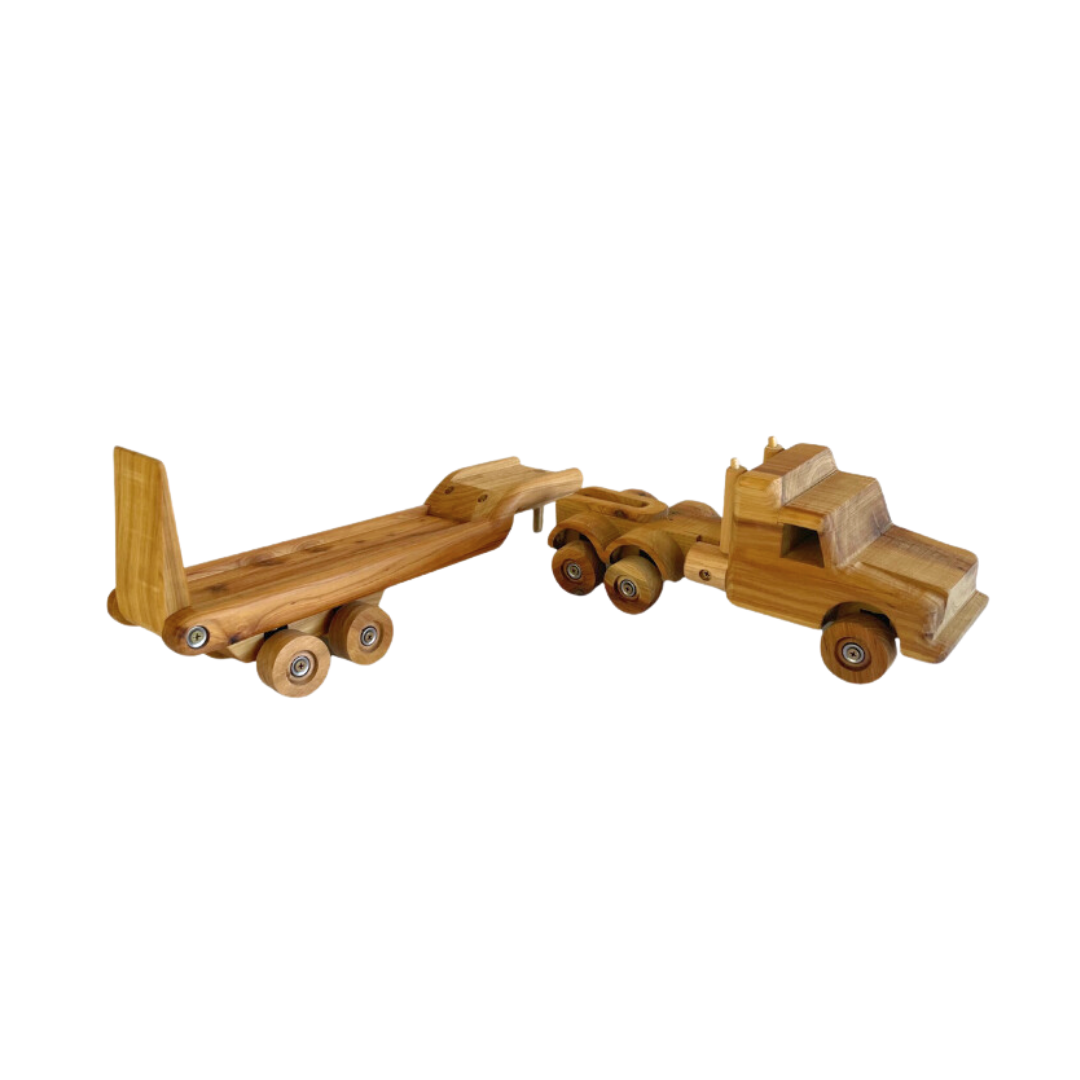 Top-down view of a wooden low loader toy set, displaying the movable prime mover and the intricacies of the trailer's construction. - Kids Toy | Imagination Toy Shop