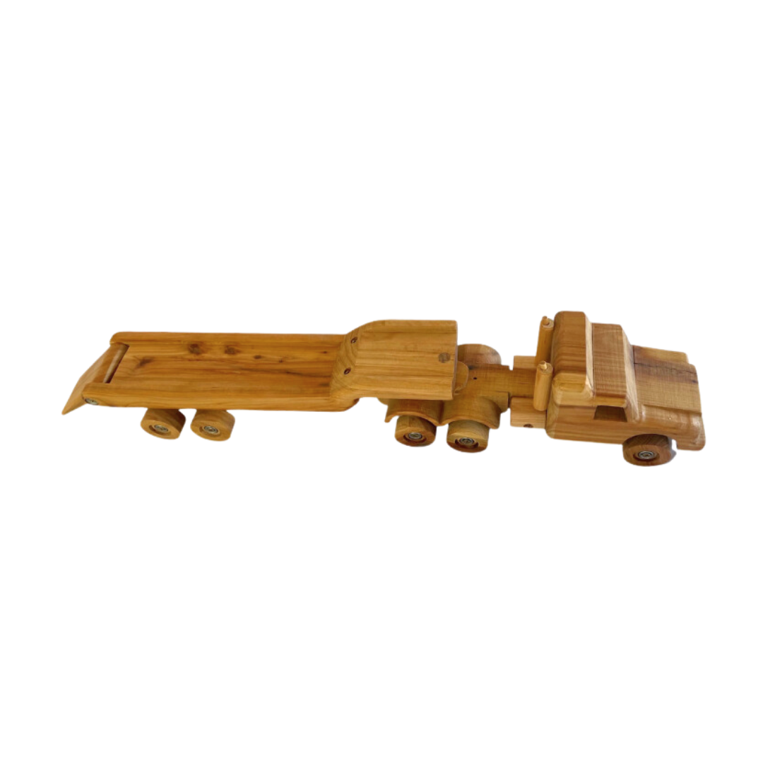 Wooden low loader toy with functional ramp in a dual axle design, shown from a side angle, highlighting the suspension and detailed woodwork. - Kids Toy | Imagination Toy Shop