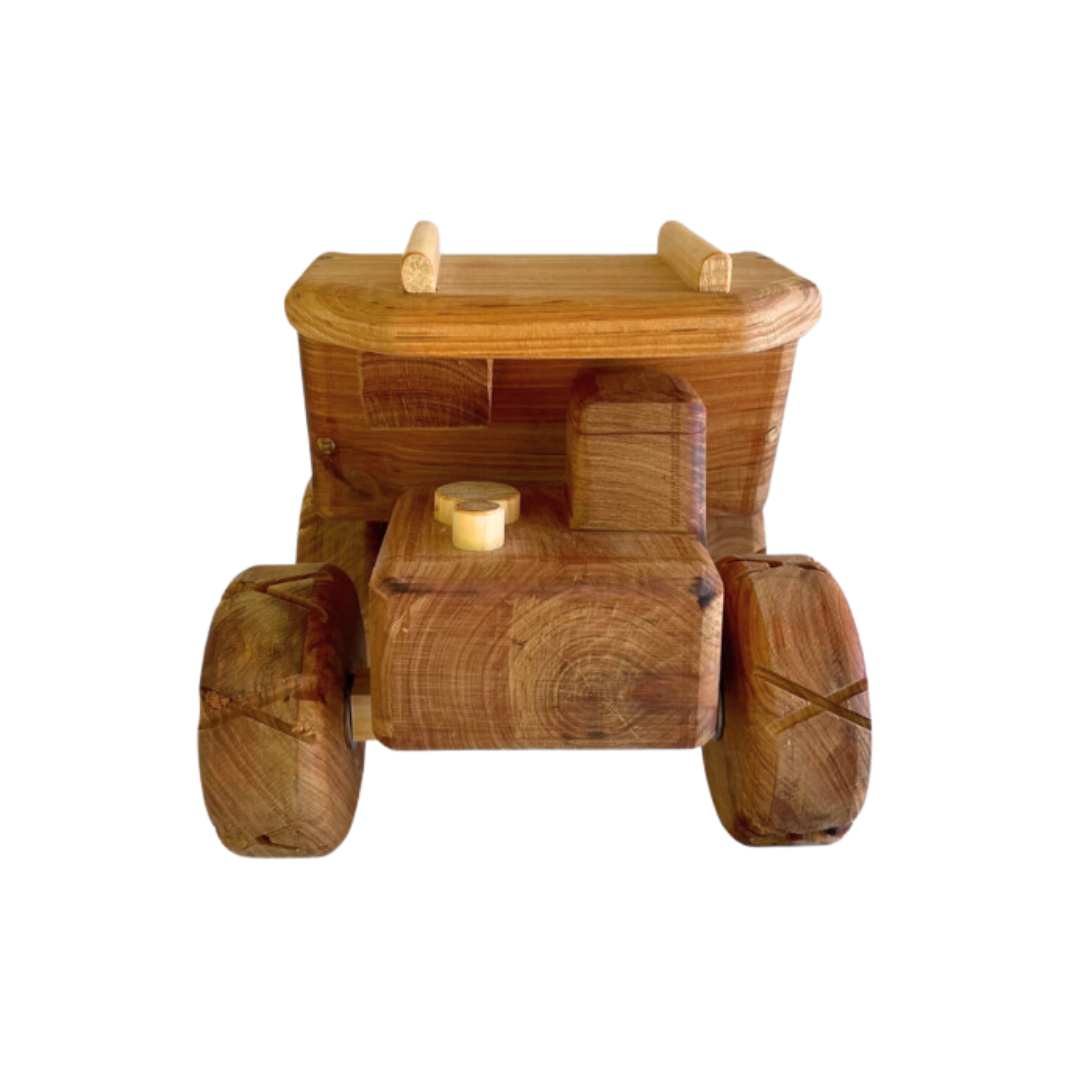 Front view of a handcrafted wooden mining dump truck with a detailed grain texture and cylindrical headlights. - Kids Toy | Imagination Toy Shop